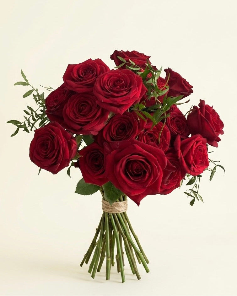 Bouquet of red roses on a beige background